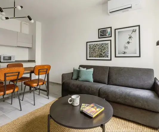 a living room with a couch and a table