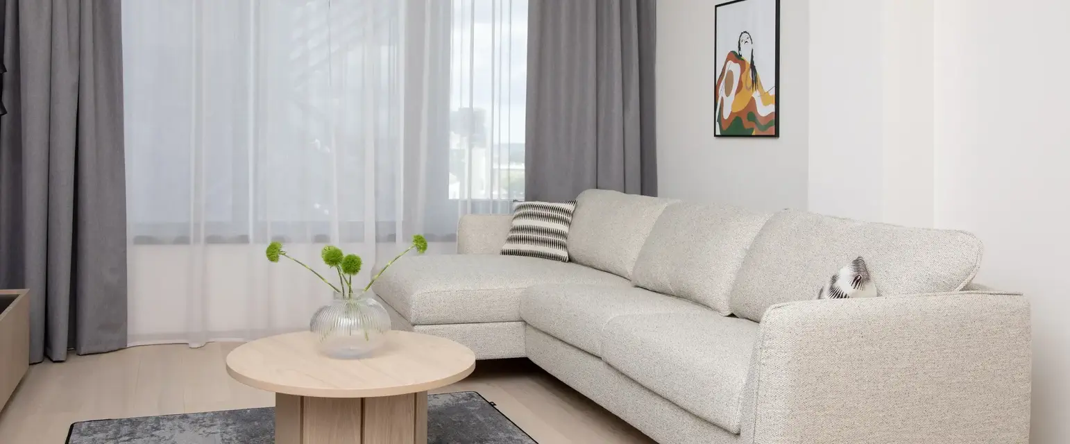 a living room with a couch and a coffee table