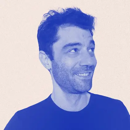 a man in a blue shirt