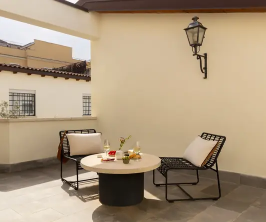 a table and chairs on a patio