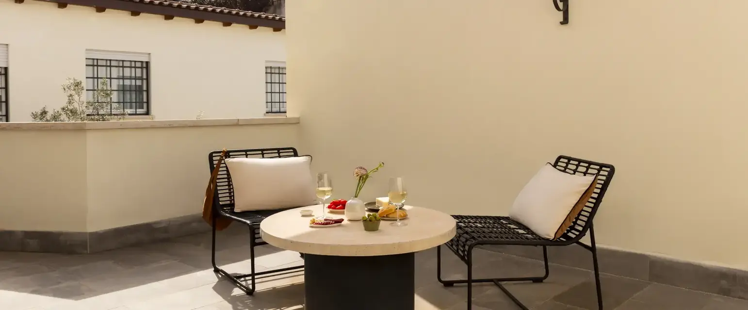a table and chairs on a patio