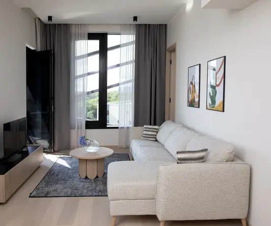 a living room with a couch and a table