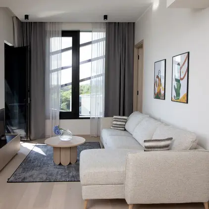 a living room with a couch and a table