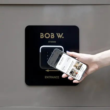 a hand holding a phone