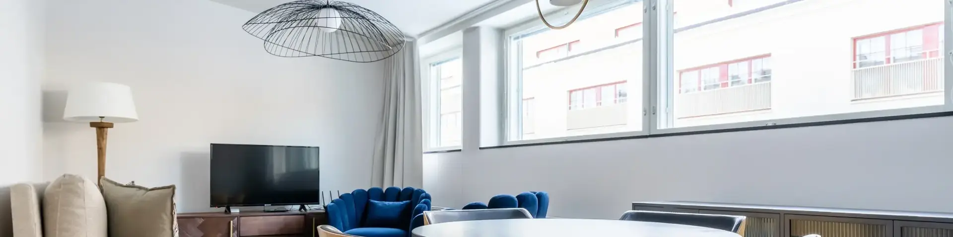 a room with a table and chairs