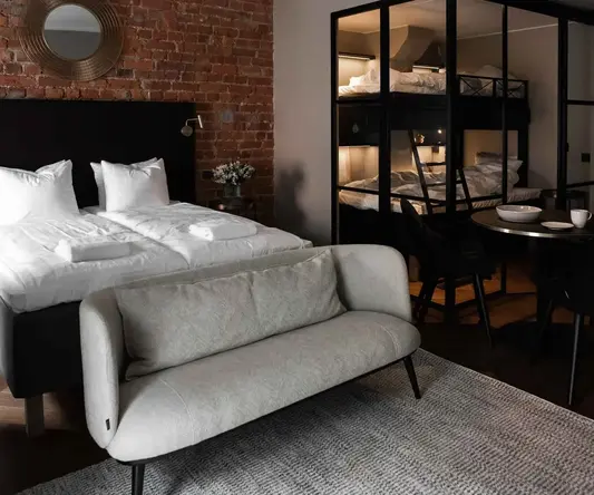 a room with a bed and a couch