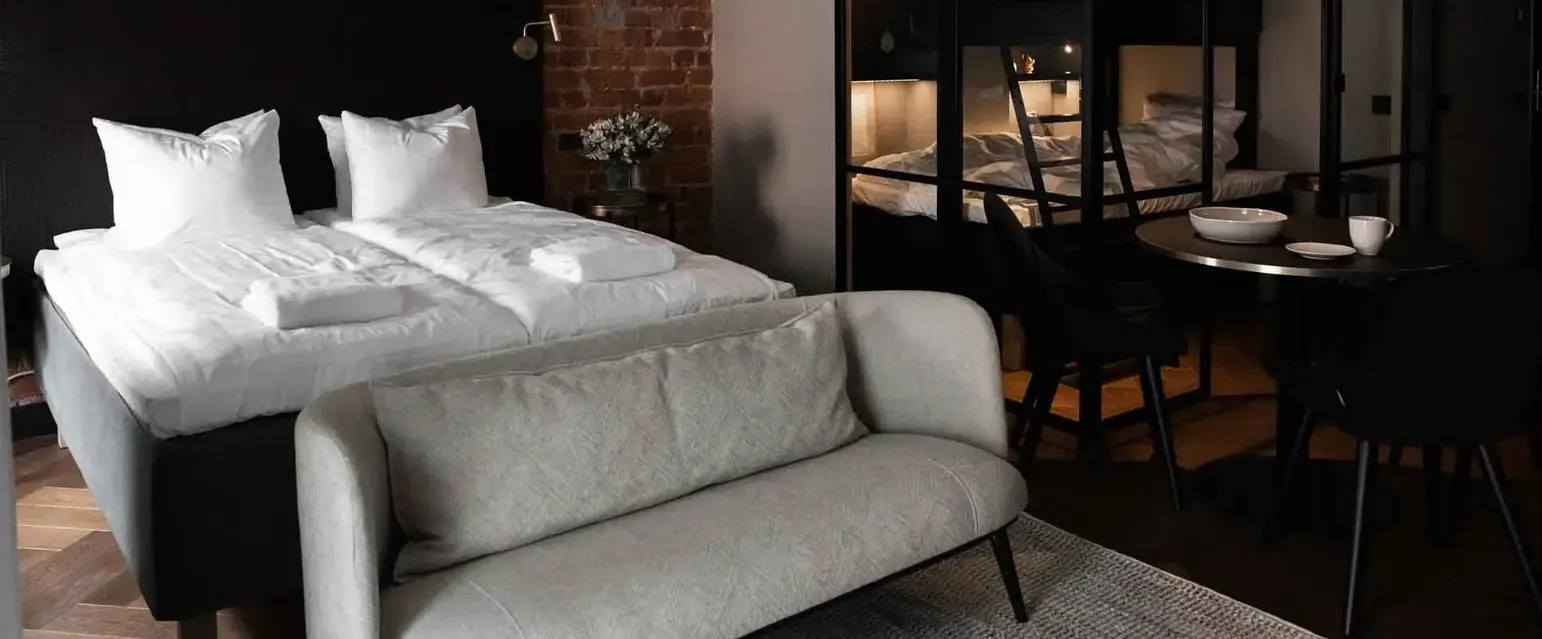 a room with a bed and a couch