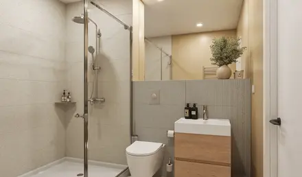 a bathroom with a shower and sink