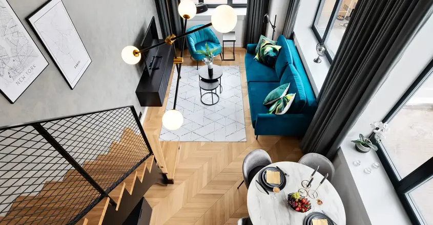 a room with a table and chairs