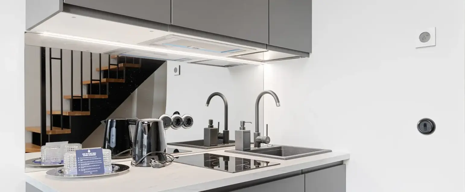 a kitchen with a sink and a sink