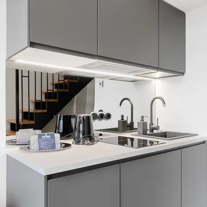 a kitchen with a sink and a sink