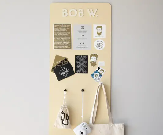 a board with a bag and a white object on it