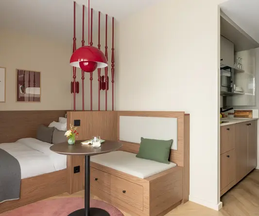 a room with a bed and a table