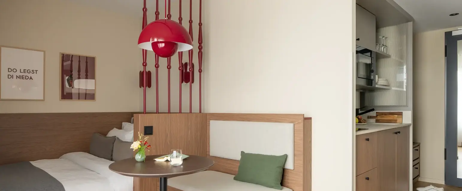a room with a bed and a table
