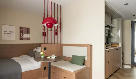 a room with a bed and a table