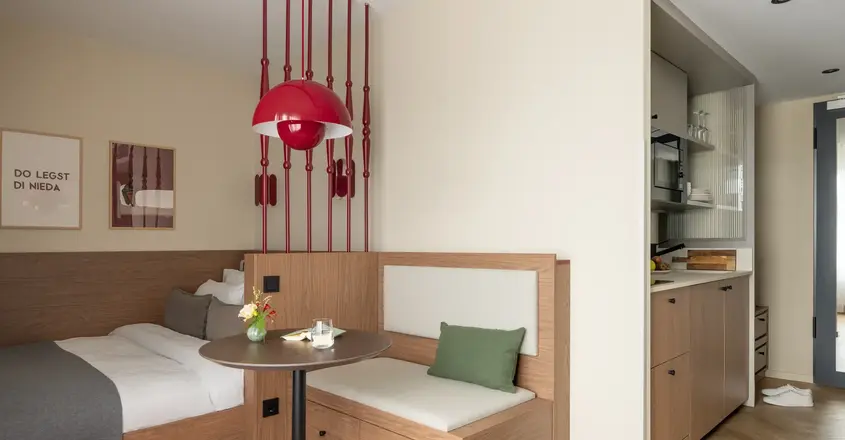 a room with a bed and a table