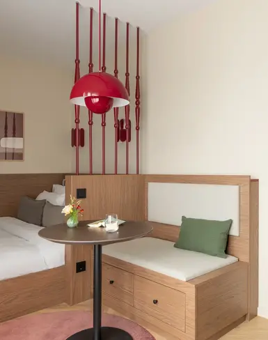 a room with a bed and a table