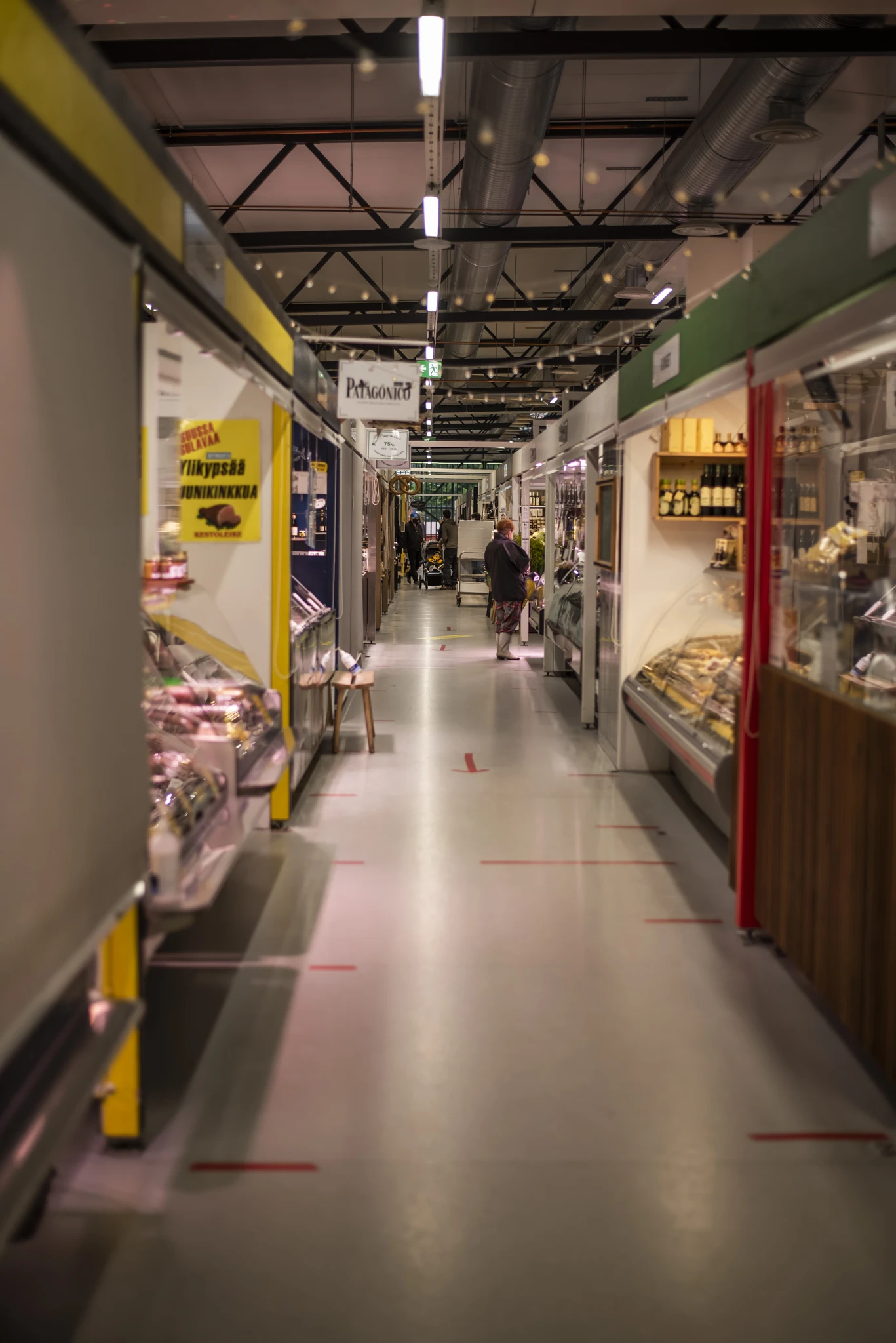 Bob W_Helsinki City Centre_Market hall aisle with Patagonico sign Bob W_Helsinki City Centre_Market hall aisle with Patagonico sign
