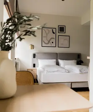 a room with a bed and a table