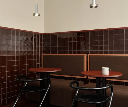 a table and chairs in a restaurant