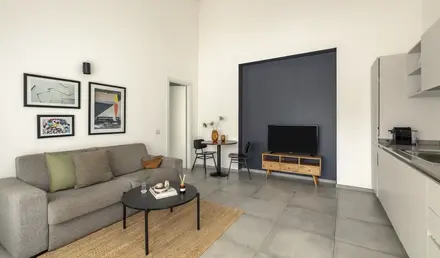 a living room with a couch and a table