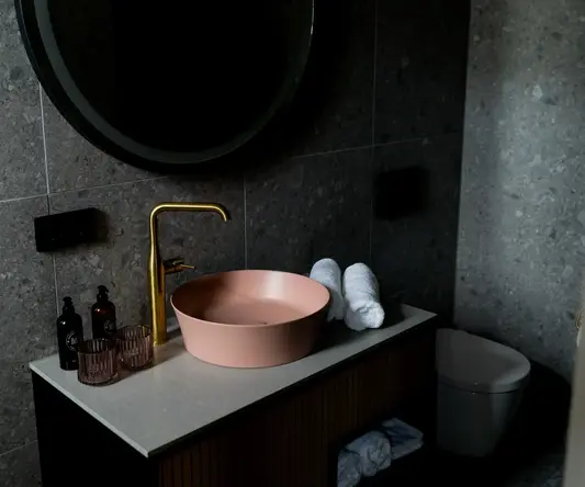 a sink and toilet in a bathroom