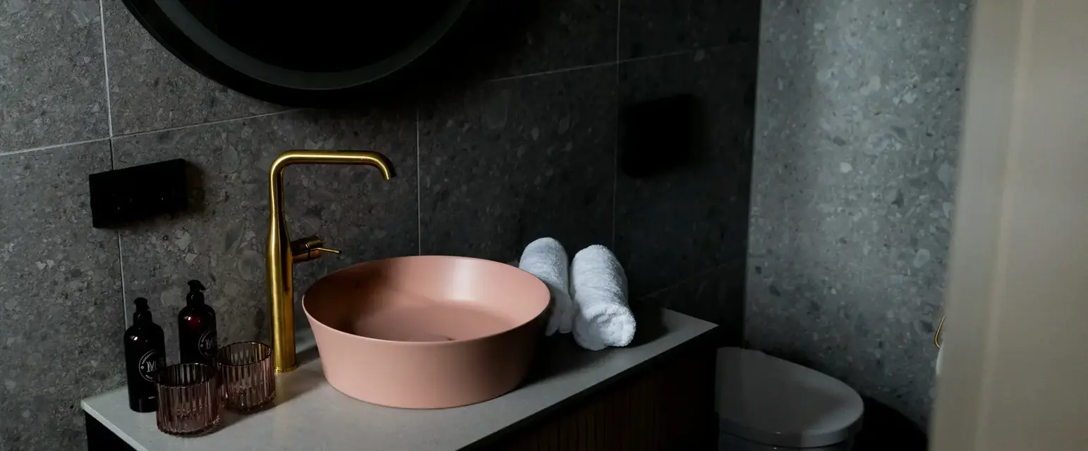 a sink and toilet in a bathroom