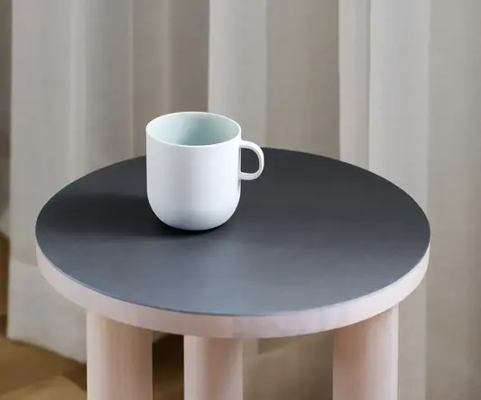 a white mug on a table