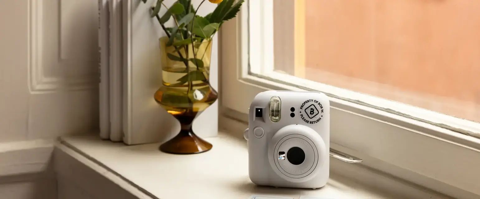 a camera on a window sill