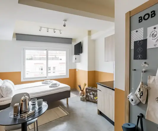 a room with a bed and a window