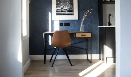 a desk and chair in a room