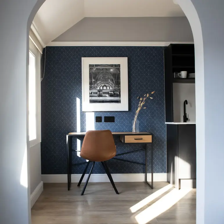 a desk and chair in a room