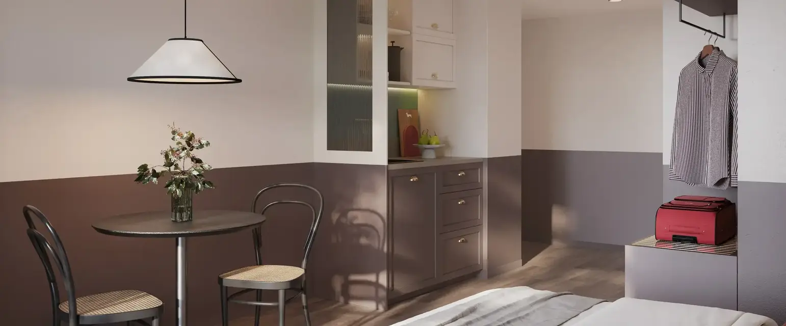 a room with a table and chairs