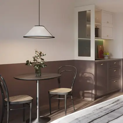 a room with a table and chairs