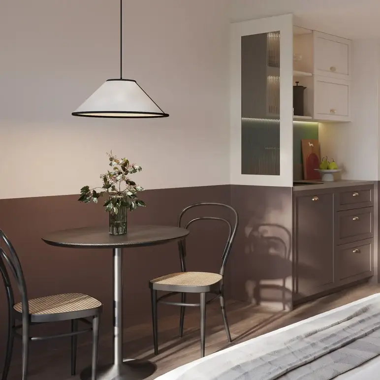 a room with a table and chairs