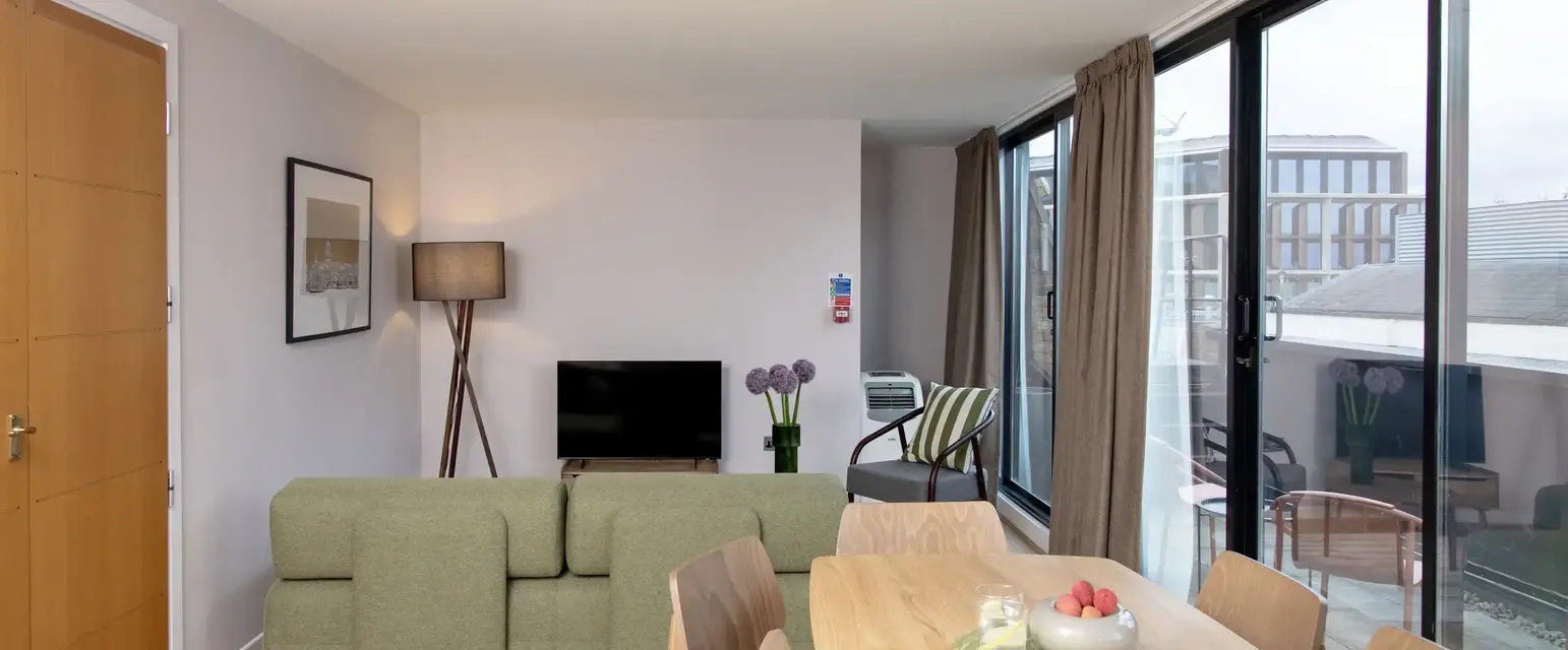 a living room with a couch and a table