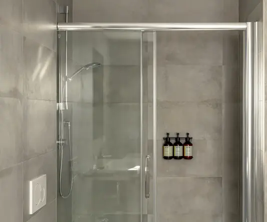 a shower with glass doors
