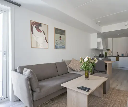 a living room with a couch and a table