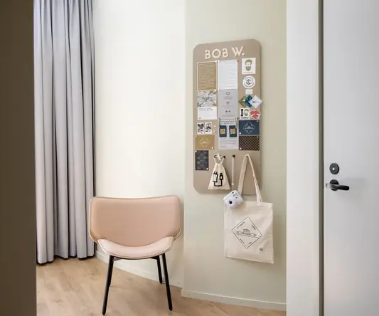 a chair and a bulletin board