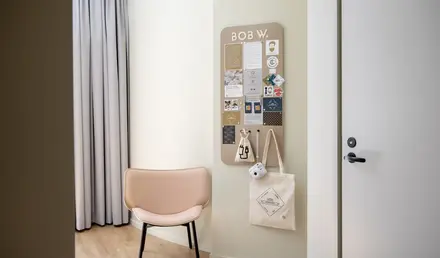 a chair and a bulletin board