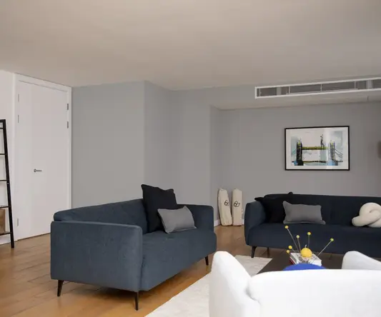 a living room with a couch and a coffee table