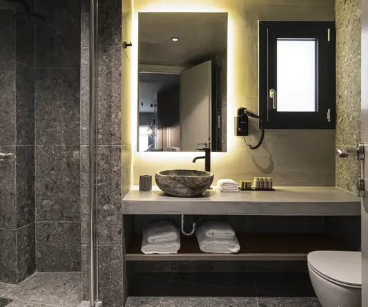 a bathroom with a sink and a shower