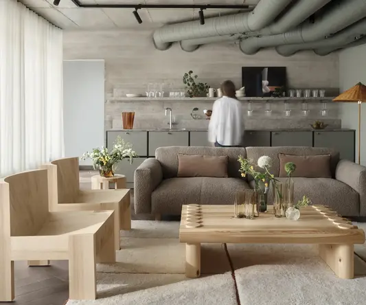 a living room with a couch and chairs