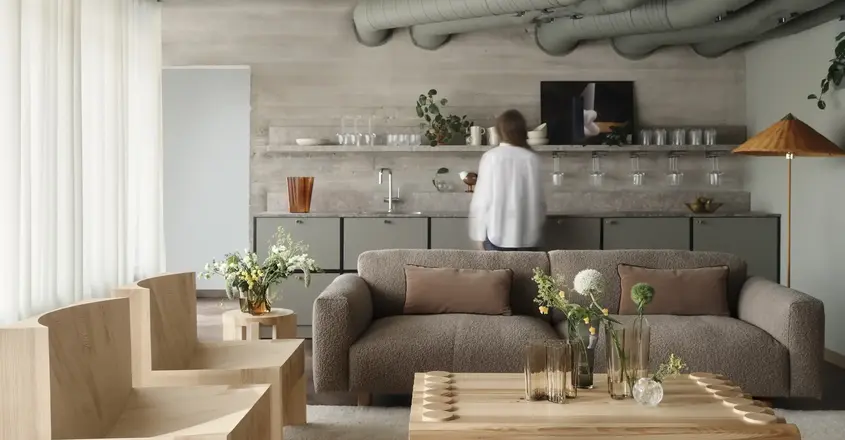 a living room with a couch and chairs