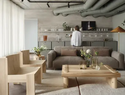 a living room with a couch and chairs