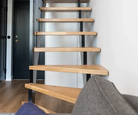 a wooden stairs in a house