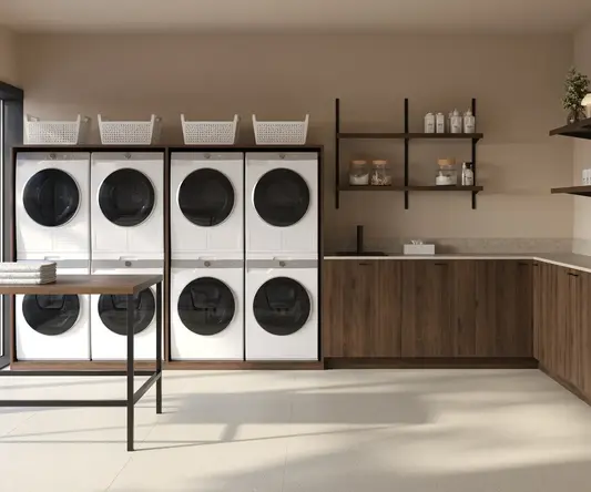 a laundry room with white and black washing machines