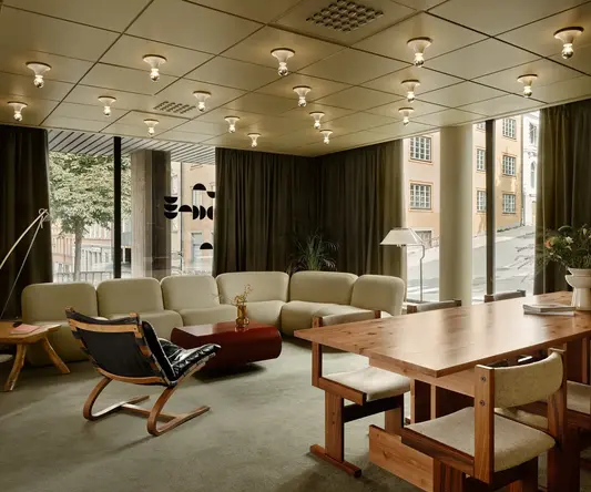 a room with a table and chairs