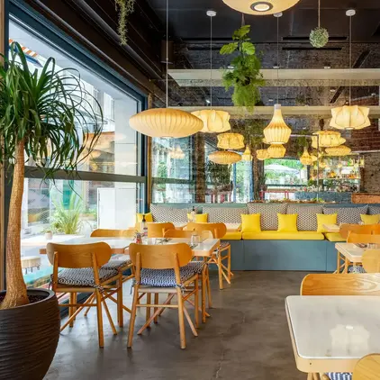 a room with tables and chairs