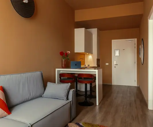 a room with a couch and a table